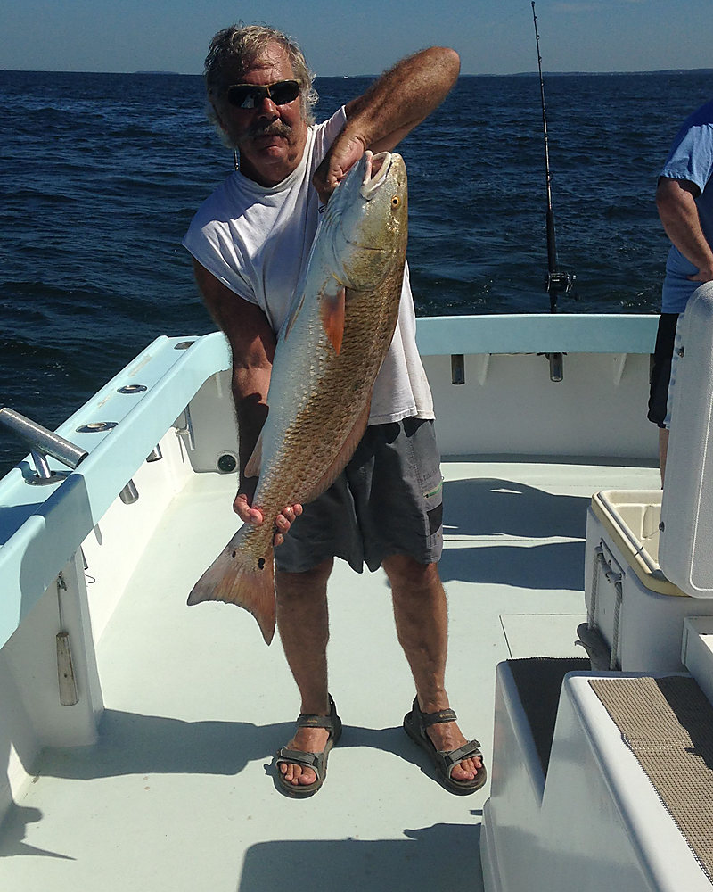 A red drum held up on the Class Act deck