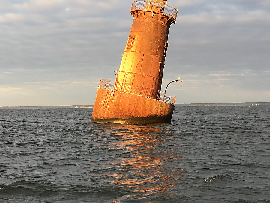 An old caisson lighthouse standing out in the Bay